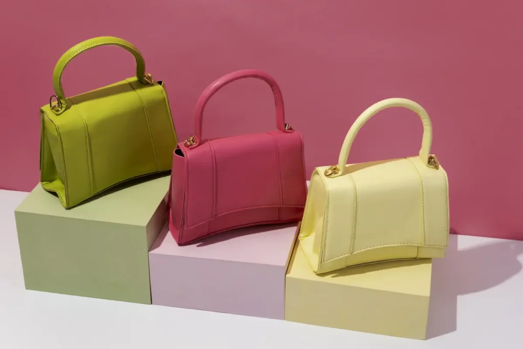 three women hand bags
